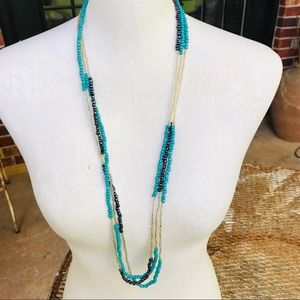 3 strands of tri-colored seed bead necklaces 17”
